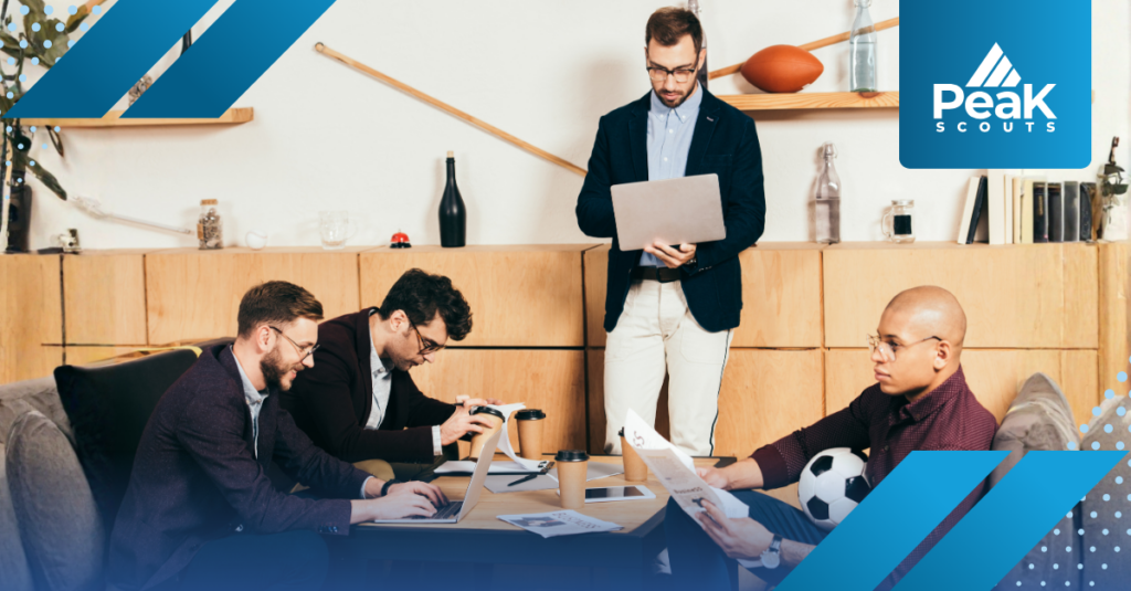 Front office staff in a sports organization gather to work