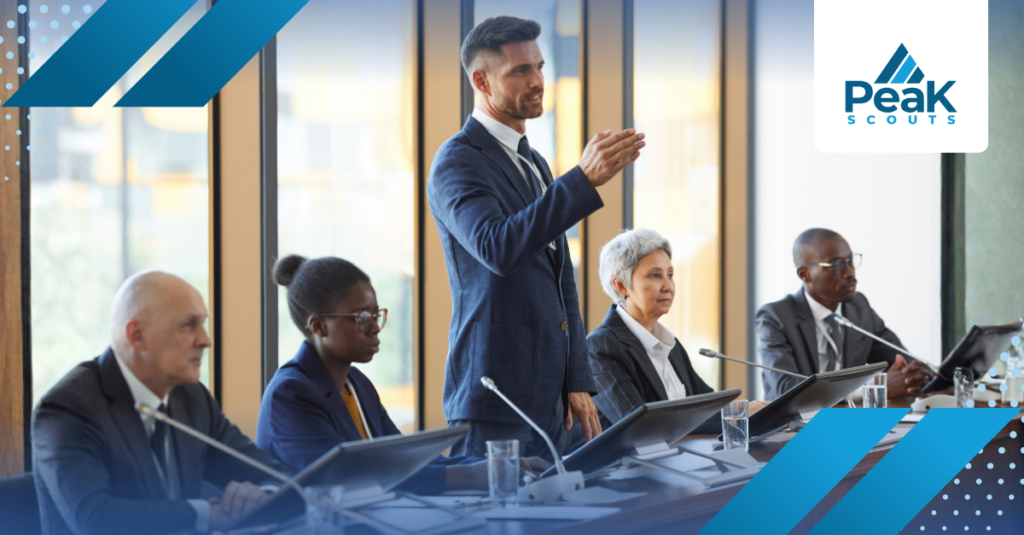 A leader presenting to diverse board members in professional meeting setting